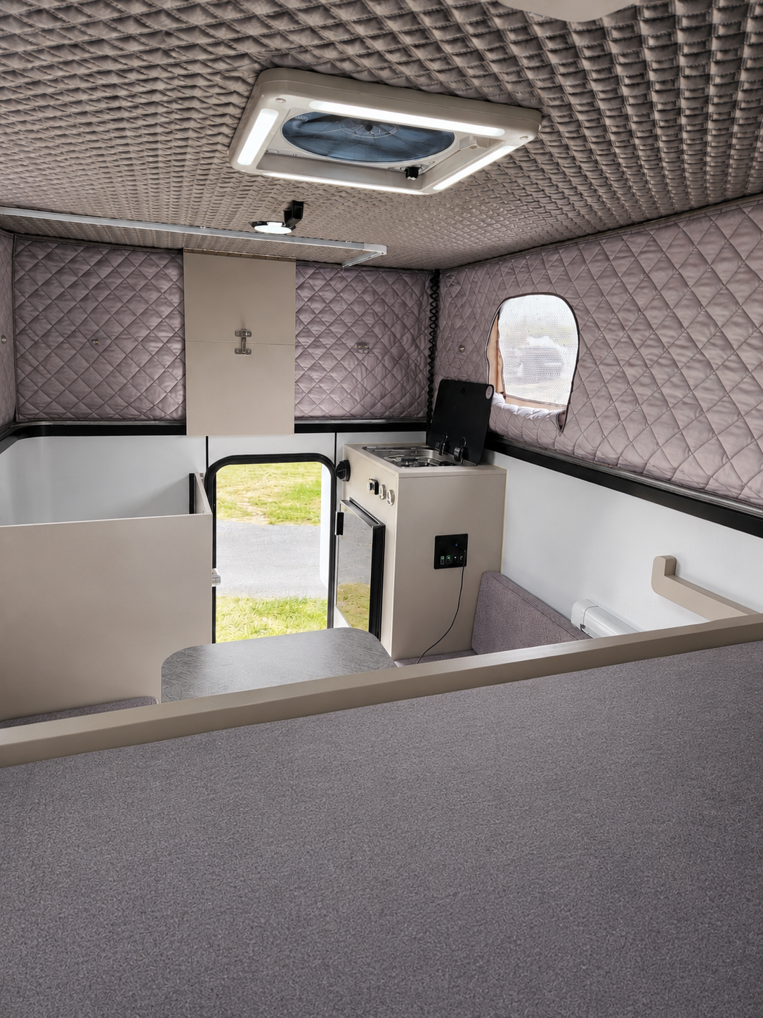 Slide On Camper pop-top interior and kitchen area